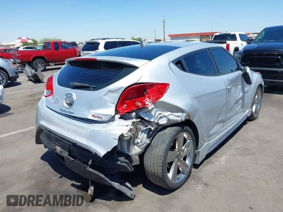 2013 Hyundai Veloster Turbo с VIN KMHTC6AE0DU177983, выставлен на аукционе IAAI как лот 42292102 с пробегом 121 142 миль миль и . История ставок и продаж доступна на DreamBid. Изображение 4.