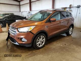 2017 Ford Escape SE z VIN 1FMCU9GD7HUA37707, wystawiony jako Copart lot #59005545 z przebiegiem 106 554 mil mil oraz Szkoda całkowita • Salvage title. Historia ofert i sprzedaży dostępna na DreamBid. Obrazek 1.