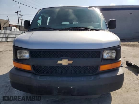 2014 Chevrolet Express Passenger LS with VIN 1GAWGPFG9E1185033, listed as a Copart auction lot 44763045 with 185,883 mi miles and Salvage title. Bid and sale history available at DreamBid. Image 5.