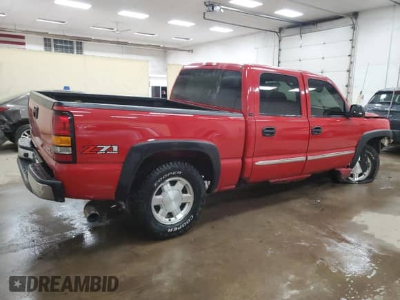 2006 GMC Sierra 1500 SLE1 with VIN 2GTEK13Z961354144, listed as a Copart auction lot 57859295 with 240,571 mi miles and Clean title. Bid and sale history available at DreamBid. Image 3.