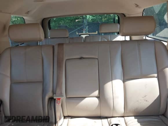 2009 Chevrolet Tahoe 2LT with VIN 1GNFK23009R103544, listed as a IAAI auction lot 42642422 with 300,378 mi miles and . Bid and sale history available at DreamBid. Image 18.