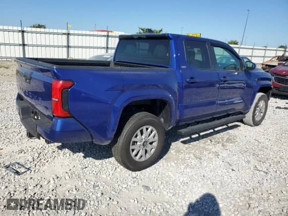 2024 Toyota Tacoma TRD Off Road with VIN 3TMLB5JN0RM031080, listed as a Copart auction lot 70222045 with 3,177 mi miles and Salvage title. Bid and sale history available at DreamBid. Image 3.