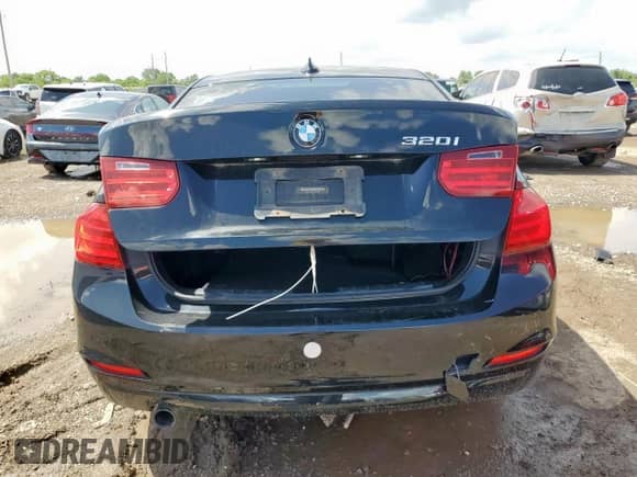 2014 BMW 3 Series 320i with VIN WBA3B1C59EK134700, listed as a Copart auction lot 60987785 with 149,684 mi miles and Salvage title. Bid and sale history available at DreamBid. Image 6.
