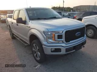 2019 Ford F-150 XLT with VIN 1FTEW1EP7KFD52881, listed as a IAAI auction lot 43240933 with 104,747 mi miles and . Bid and sale history available at DreamBid. Image 1.