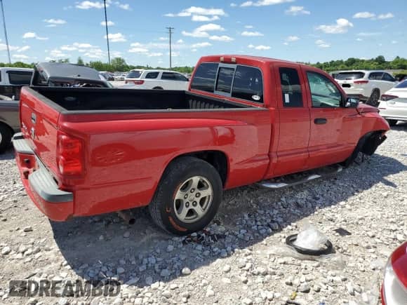 2005 Dodge Dakota SLT с VIN 1D7HE42N75S149298, выставлен на аукционе Copart как лот 57951265 с пробегом 171 884 миль миль и Списание • Salvage title. История ставок и продаж доступна на DreamBid. Изображение 3.