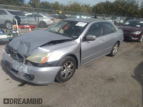 2006 Honda Accord EX with VIN 1HGCM56706A064224, listed as a IAAI auction lot 43545033 with 150,555 mi miles and . Bid and sale history available at DreamBid. Image 2.