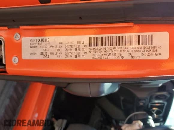 2019 Jeep Wrangler Sport S with VIN 1C4GJXAN9KW521586, listed as a Copart auction lot 70373935 with 35,340 mi miles and Salvage title. Bid and sale history available at DreamBid. Image 14.