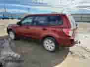 2009 Subaru Forester X with VIN JF2SH61679H774012, listed as a Copart auction lot 82427905 with 216,403 mi miles and Salvage title. Bid and sale history available at DreamBid. Image 2.