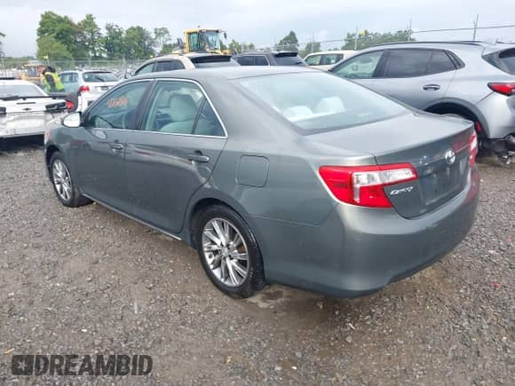 2012 Toyota Camry L with VIN 4T1BF1FK3CU516061, listed as a IAAI auction lot 43132806 with 97,311 mi miles and . Bid and sale history available at DreamBid. Image 3.