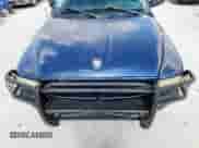2002 Dodge Dakota Sport z VIN 1B7HL38N62S692851, wystawiony jako Copart lot #63767335 z przebiegiem 218 871 mil mil oraz Szkoda całkowita • Salvage title. Historia ofert i sprzedaży dostępna na DreamBid. Obrazek 11.