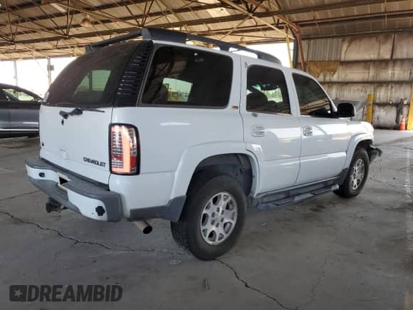 2002 Chevrolet Tahoe Z71 с VIN 1GNEK13Z02R274661, выставлен на аукционе Copart как лот 62600085 с пробегом 135 780 миль миль и Списание • Salvage title. История ставок и продаж доступна на DreamBid. Изображение 3.