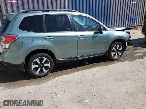 2018 Subaru Forester Premium z VIN JF2SJAECXJH568131, wystawiony jako Copart lot #81117215 z przebiegiem 86 856 mil mil oraz Szkoda całkowita • Salvage title. Historia ofert i sprzedaży dostępna na DreamBid. Obrazek 14.