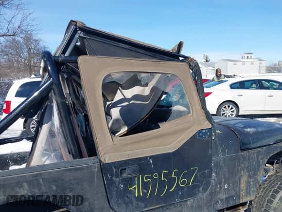 1991 Jeep Wrangler with VIN 2J4FY19P1MJ154813, listed as a IAAI auction lot 41595567 with Not provided miles and . Bid and sale history available at DreamBid. Image 13.