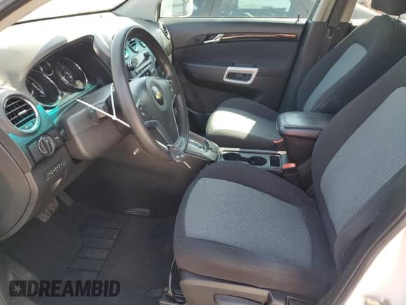 2014 Chevrolet Captiva Sport LS z VIN 3GNAL1EK0ES590395, wystawiony jako Copart lot #52445555 z przebiegiem 143 320 mil mil oraz Szkoda całkowita • Salvage title. Historia ofert i sprzedaży dostępna na DreamBid. Obrazek 7.