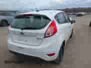 2017 Ford Fiesta S z VIN 3FADP4TJ2HM161814, wystawiony jako IAAI lot #41849003 z przebiegiem 107 836 mil mil oraz . Historia ofert i sprzedaży dostępna na DreamBid. Obrazek 4.