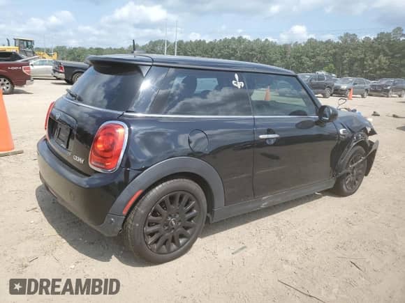 2019 MINI Hardtop Cooper with VIN WMWXP5C57K2H30753, listed as a Copart auction lot 57347275 with 98,063 mi miles and Salvage title. Bid and sale history available at DreamBid. Image 3.