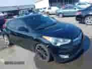 2012 Hyundai Veloster w/Black Int z VIN KMHTC6AD4CU078413, wystawiony jako IAAI lot #42611032 z przebiegiem 142 295 mil mil oraz . Historia ofert i sprzedaży dostępna na DreamBid. Obrazek 1.