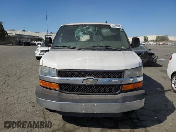 2012 Chevrolet Express Passenger 1LT with VIN 1GAZG1FG4C1100252, listed as a Copart auction lot 73242444 with 76,779 mi miles and Salvage title. Bid and sale history available at DreamBid. Image 5.