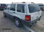 1995 Jeep Grand Cherokee Laredo with VIN 1J4GZ58Y2SC582464, listed as a IAAI auction lot 43330659 with 210,650 mi miles and . Bid and sale history available at DreamBid. Image 3.