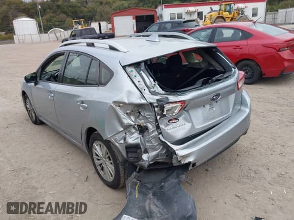 2018 Subaru Impreza Premium with VIN 4S3GTAB68J3705271, listed as a IAAI auction lot 43439613 with 157,474 mi miles and . Bid and sale history available at DreamBid. Image 3.