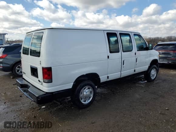 2009 Ford Econoline Cargo Commercial с VIN 1FTNE14W39DA74322, выставлен на аукционе Copart как лот 49323705 с пробегом 300 811 миль миль и Списание • Salvage title. История ставок и продаж доступна на DreamBid. Изображение 3.