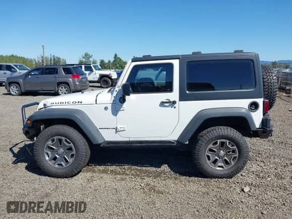 2013 Jeep Wrangler Rubicon with VIN 1C4HJWCG7DL559674, listed as a IAAI auction lot 43228071 with 132,155 mi miles and . Bid and sale history available at DreamBid. Image 15.