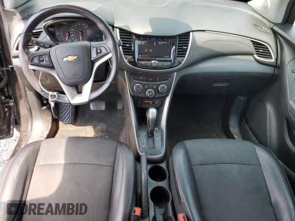 2020 Chevrolet Trax LT with VIN KL7CJLSBXLB011488, listed as a Copart auction lot 63834645 with 68,684 mi miles and Salvage title. Bid and sale history available at DreamBid. Image 8.