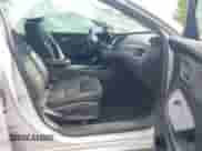 2018 Chevrolet Impala LT with VIN 1G1105SA1JU144554, listed as a IAAI auction lot 42374582 with 129,926 mi miles and . Bid and sale history available at DreamBid. Image 5.