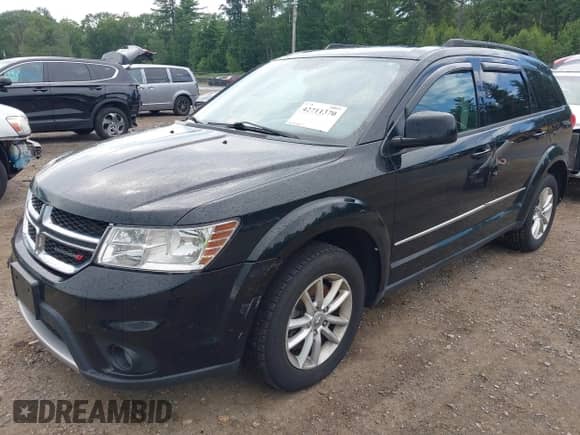 2017 Dodge Journey SXT with VIN 3C4PDDBG0HT515163, listed as a IAAI auction lot 42711370 with 102,440 mi miles and . Bid and sale history available at DreamBid. Image 2.