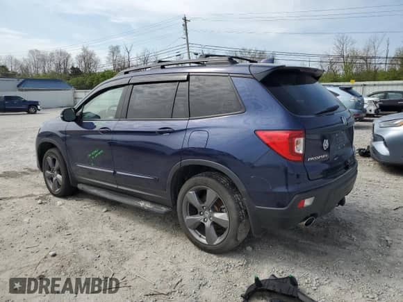 2021 Honda Passport Touring with VIN 5FNYF8H99MB042984, listed as a Copart auction lot 52858975 with 35,308 mi miles and Salvage title. Bid and sale history available at DreamBid. Image 2.