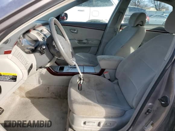 2006 Hyundai Azera SE с VIN KMHFC46F46A073536, выставлен на аукционе Copart как лот 85753124 с пробегом 201 014 миль миль и Чистый • Clean title. История ставок и продаж доступна на DreamBid. Изображение 7.
