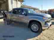 2023 Chevrolet Silverado 1500 LT with VIN 1GCRDDED8PZ114929, listed as a Copart auction lot 80703884 with 22,698 mi miles and Salvage title. Bid and sale history available at DreamBid. Image 4.