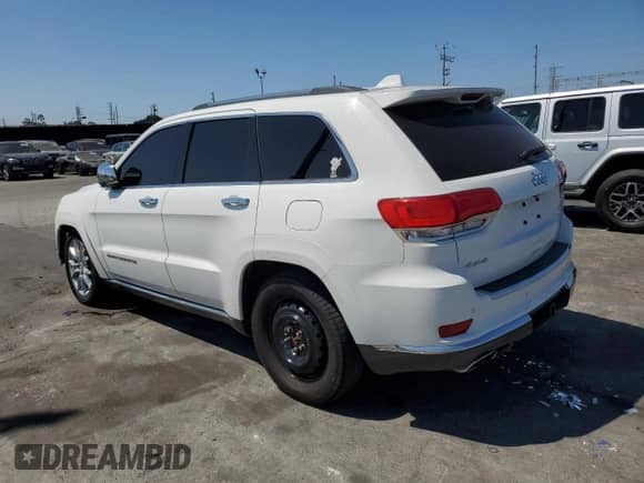 2014 Jeep Grand Cherokee Summit with VIN 1C4RJFJT4EC523334, listed as a Copart auction lot 70189445 with 85,386 mi miles and Salvage title. Bid and sale history available at DreamBid. Image 2.
