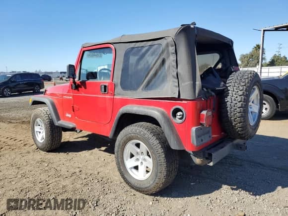 2001 Jeep Wrangler SE with VIN 1J4FA29P91P367534, listed as a Copart auction lot 81644824 with 156,597 mi miles and Clean title. Bid and sale history available at DreamBid. Image 2.