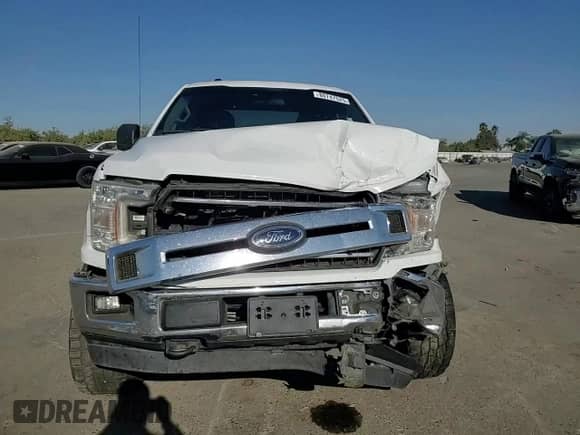 2018 Ford F-150 XLT z VIN 1FTEW1EG9JFA19483, wystawiony jako Copart lot #80747525 z przebiegiem 91 561 mil mil oraz Szkoda całkowita • Salvage title. Historia ofert i sprzedaży dostępna na DreamBid. Obrazek 13.