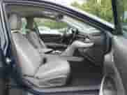 2021 Toyota Camry Hybrid XLE with VIN 4T1F31AK8MU563752, listed as a IAAI auction lot 42134620 with 19,484 mi miles and . Bid and sale history available at DreamBid. Image 5.