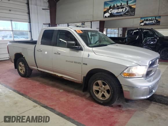 2011 Ram 1500 SLT with VIN 1D7RV1GT8BS644678, listed as a Copart auction lot 86136235 with 169,577 mi miles and Salvage title. Bid and sale history available at DreamBid. Image 4.