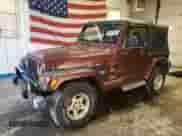 2001 Jeep Wrangler Sahara z VIN 1J4FA59S11P334534, wystawiony jako Copart lot #90651005 z przebiegiem 155 822 mil mil oraz Czysty tytuł • Clean title. Historia ofert i sprzedaży dostępna na DreamBid. Obrazek 1.