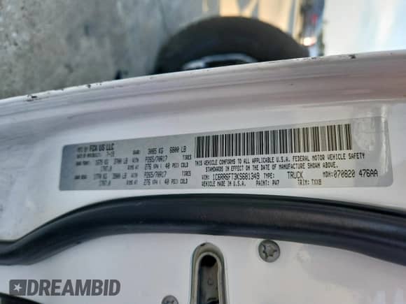 2019 Ram 1500 Tradesman z VIN 1C6RR6FT3KS681349, wystawiony jako Copart lot #70053415 z przebiegiem Nie podano mil oraz Szkoda całkowita • Salvage title. Historia ofert i sprzedaży dostępna na DreamBid. Obrazek 12.