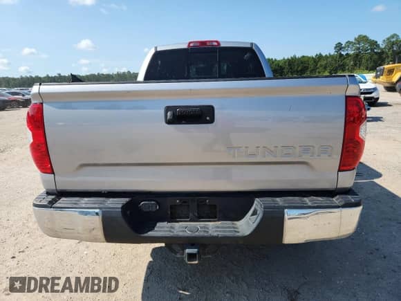 2019 Toyota Tundra SR с VIN 5TFRM5F12KX143986, выставлен на аукционе Copart как лот 69851445 с пробегом 142 082 миль миль и Списание • Salvage title. История ставок и продаж доступна на DreamBid. Изображение 6.