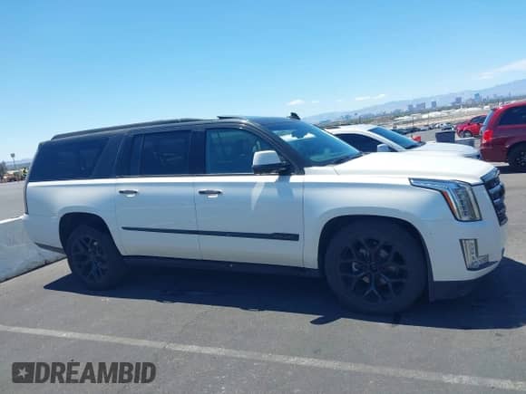 2015 Cadillac Escalade ESV Premium z VIN 1GYS4TKJ1FR617619, wystawiony jako IAAI lot #42218407 z przebiegiem 159 395 mil mil oraz . Historia ofert i sprzedaży dostępna na DreamBid. Obrazek 13.