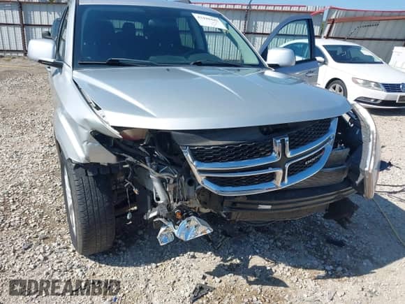 2014 Dodge Journey SXT with VIN 3C4PDCBB3ET112742, listed as a IAAI auction lot 43420445 with 113,538 mi miles and . Bid and sale history available at DreamBid. Image 6.
