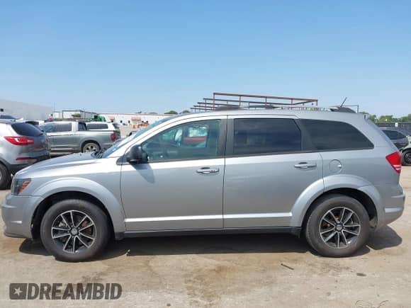 2017 Dodge Journey SE with VIN 3C4PDCAB6HT606552, listed as a IAAI auction lot 43027408 with 68,964 mi miles and . Bid and sale history available at DreamBid. Image 14.