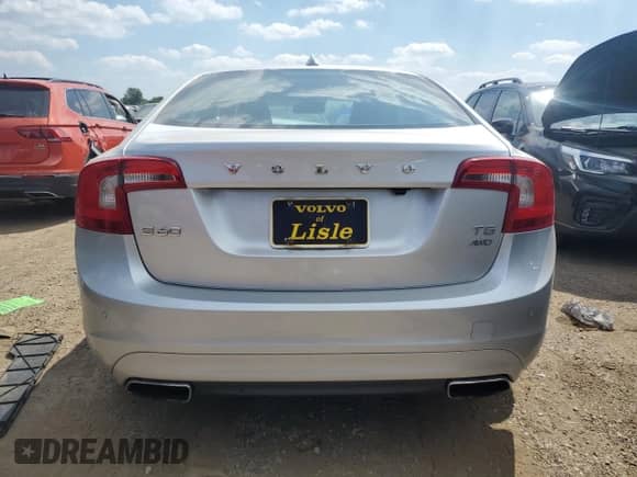 2014 Volvo S60 T5 z VIN YV1612FH9E2293161, wystawiony jako Copart lot #68771915 z przebiegiem 52 472 mil mil oraz Szkoda całkowita • Salvage title. Historia ofert i sprzedaży dostępna na DreamBid. Obrazek 6.