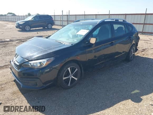 2020 Subaru Impreza Premium with VIN 4S3GTAD67L3712955, listed as a IAAI auction lot 42668679 with 69,300 mi miles and . Bid and sale history available at DreamBid. Image 2.