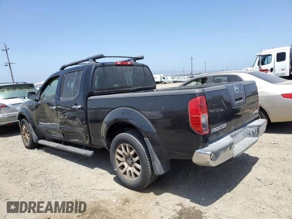 2012 Nissan Frontier SV with VIN 1N6AD0FV7CC473034, listed as a Copart auction lot 58096075 with 117,270 mi miles and Salvage title. Bid and sale history available at DreamBid. Image 2.