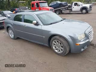 2006 Chrysler 300 C with VIN 2C3KA63HX6H431609, listed as a IAAI auction lot 43600550 with 51,206 mi miles and . Bid and sale history available at DreamBid. Image 1.