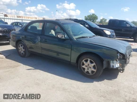 2001 Hyundai Sonata GLS z VIN KMHWF35V11A485934, wystawiony jako Copart lot #69853585 z przebiegiem 120 924 mil mil oraz Szkoda całkowita • Salvage title. Historia ofert i sprzedaży dostępna na DreamBid. Obrazek 4.