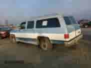 1990 Chevrolet Suburban с VIN 1GNGV26K8LF160480, выставлен на аукционе Copart как лот 83665974 с пробегом 246 841 миль миль и Чистый • Clean title. История ставок и продаж доступна на DreamBid. Изображение 2.