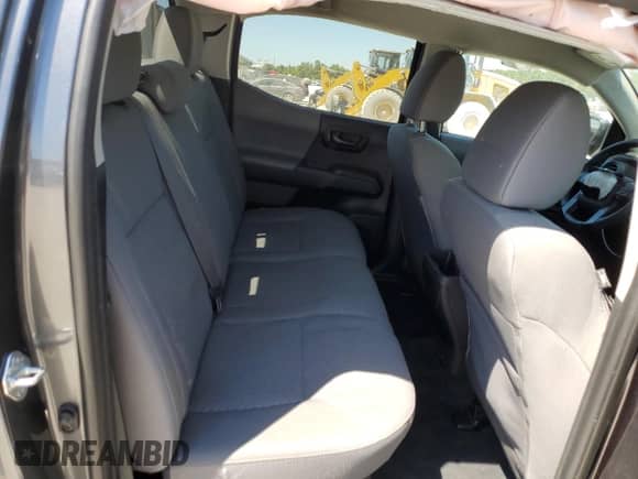 2021 Toyota Tacoma TRD Off Road with VIN 3TMCZ5AN9MM392750, listed as a Copart auction lot 70289245 with 76,487 mi miles and Salvage title. Bid and sale history available at DreamBid. Image 10.